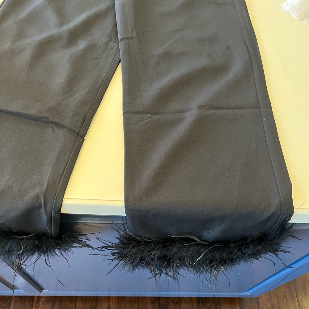Black pepper mayo long pants with feathered bottom